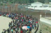 Videos: Emigres in Migrant Caravan Storm Border; U.S. Shuts Down Crossings in Response